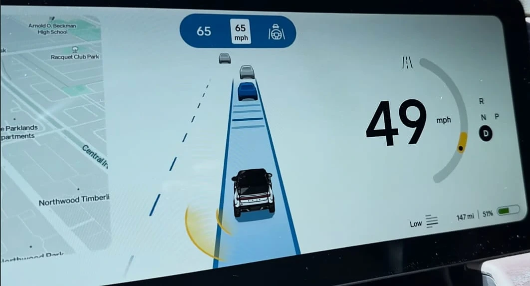 Rivian car screen: speed over the road ahead